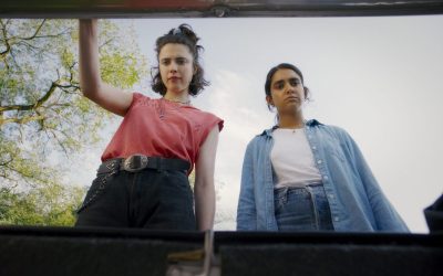 ‘Drive-Away Dolls’ Review: Ethan Coen Teams Up With Game Cast For Wacky Lesbian-Driven B-Movie Crime Comedy