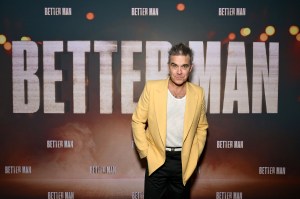 Robbie Williams Explains Why ‘Better Man’ Depicts Him As A “Cheeky Monkey”